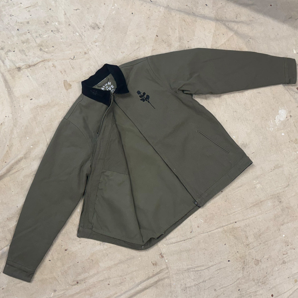 Chaqueta de lona gruesa con bolsillo de tigre