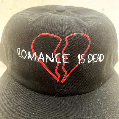 Romance Is Dead Cap