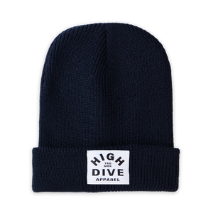 Gorro azul marino francés con etiqueta HDA blanca